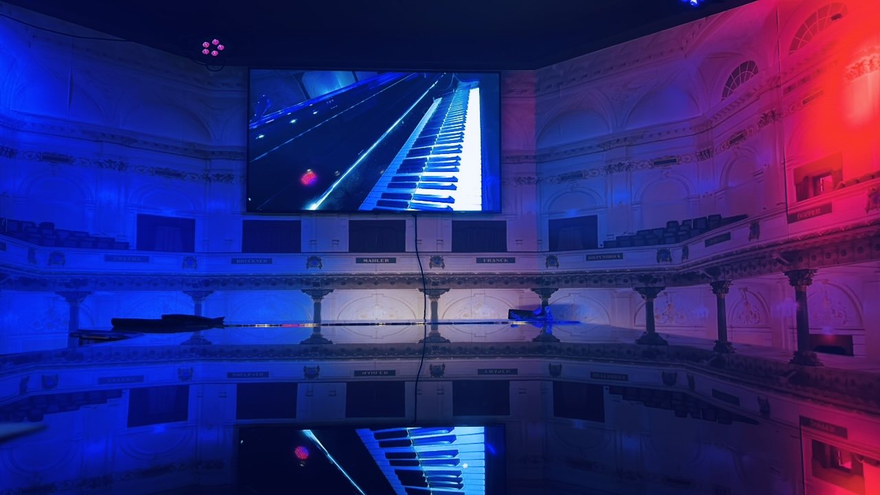 The Velvet Room in blue and red light, seen across the room