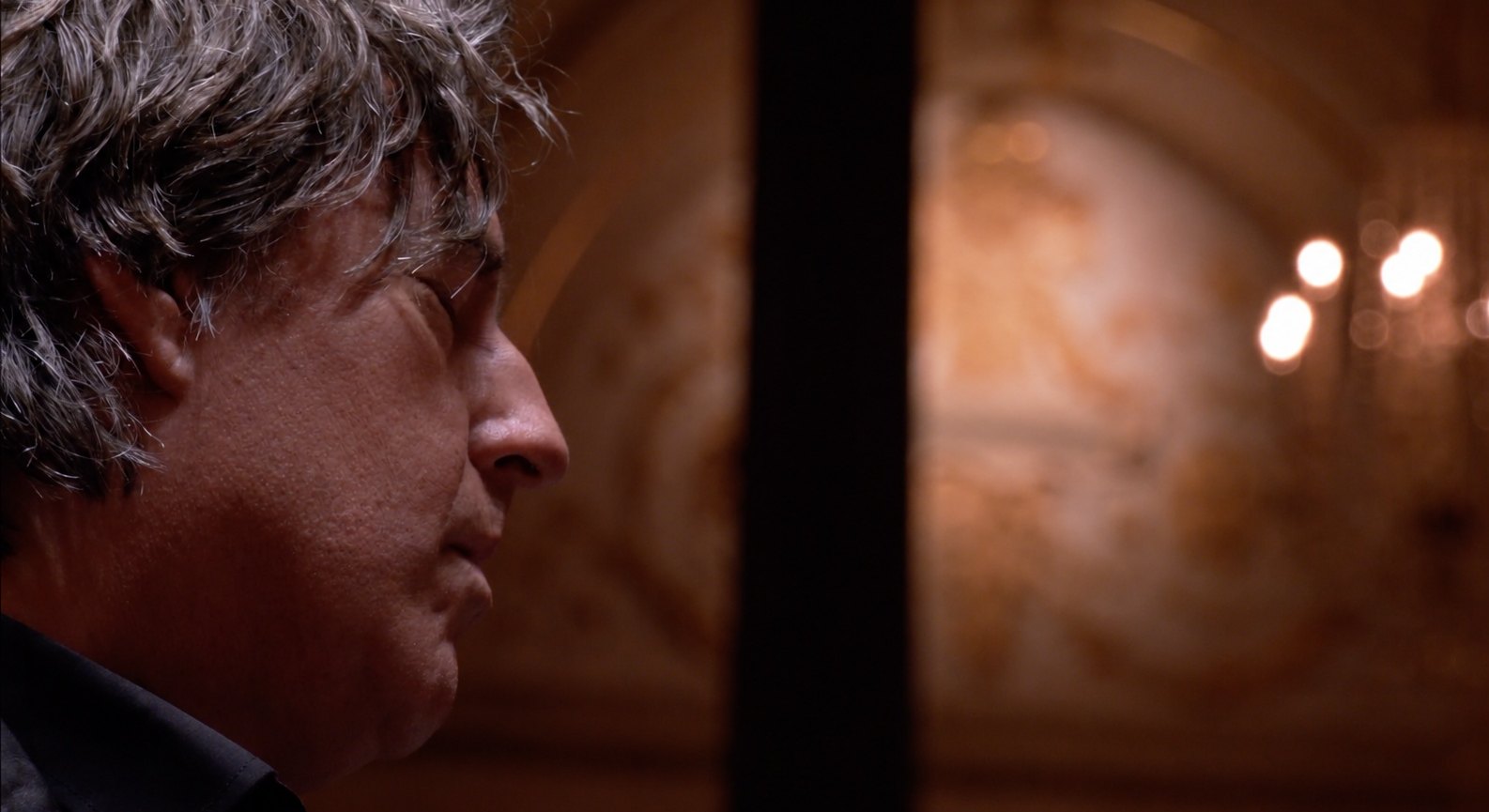 Michiel Borstlap in profile at the piano
